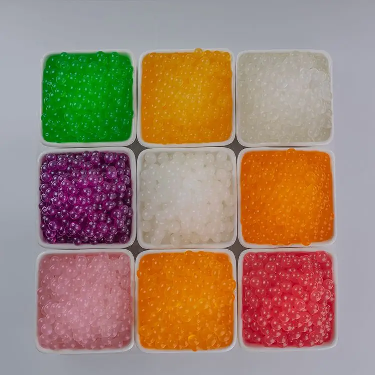 Sodium alginate passion fruit flavor round shape 1.3kg bag yellow color pearls popping boba