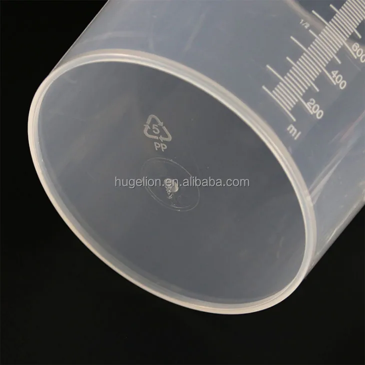 Hot sale plastic 30 ml measuring cup with scale for sale