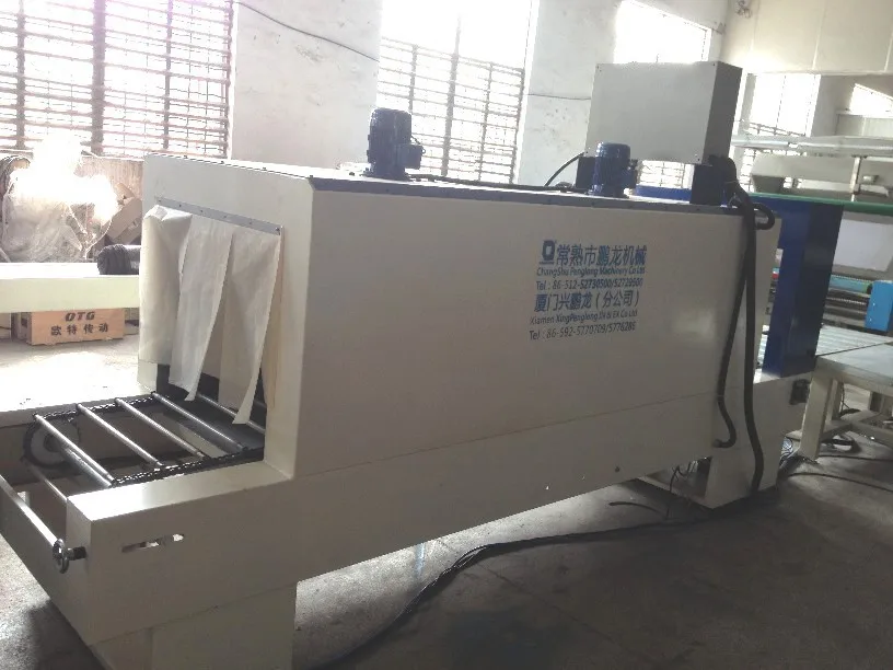 
Automatic Heat Shrink wrapper Machine to Pack Fabric Rolls By P.E. Film 