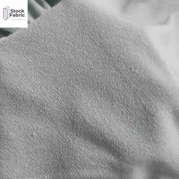 China textile hot selling woven washed cotton linen paper dyed fabric stock lot for men pants