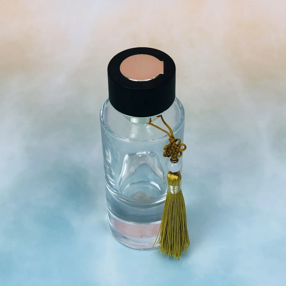 High quality round luxury perfume bottles wholesale perfume bottles perfume spray bottle with tassels