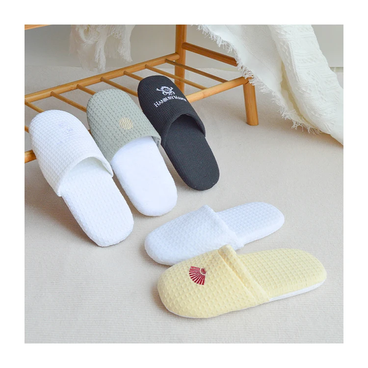 Factory sale cheap prices safety customized white waffle disposable slippers for homestay hotels