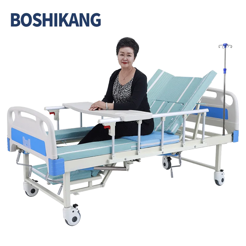Медицинские товары Boshikang ручная Больничная кровать для ухода за пожилыми людьми со столом и отверстием