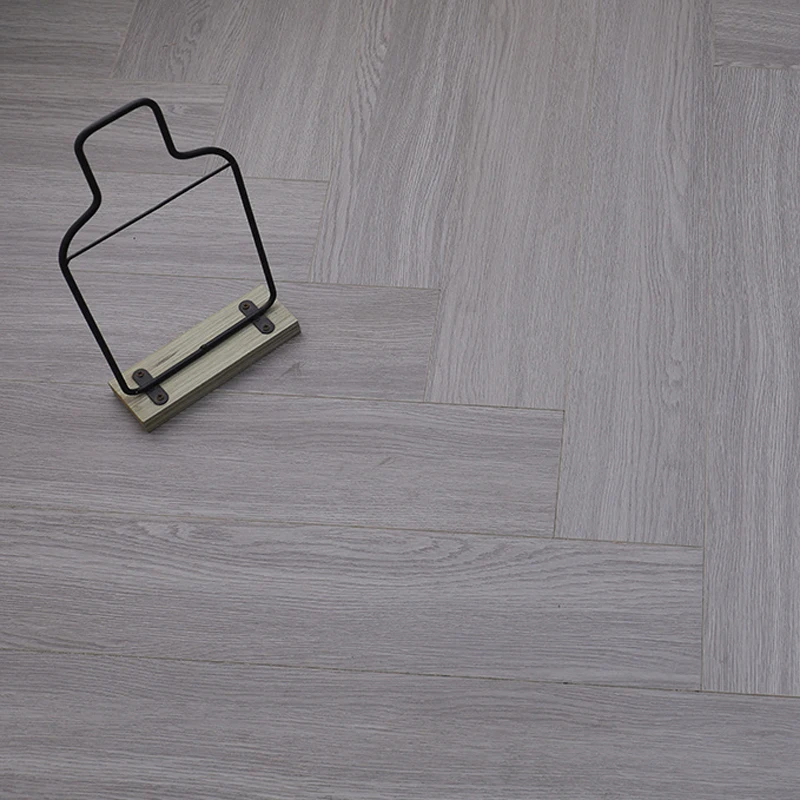 2024 China Popular Gray Herringbone Engineering Wood Flooring Simple Indoor Style Solid Wood Leather Click Modern Elegant