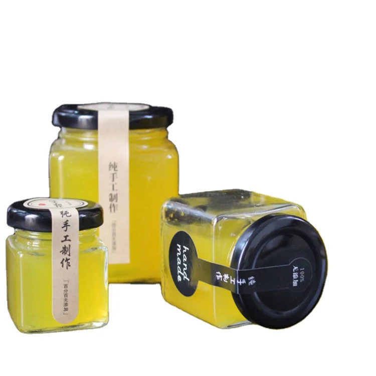 
Square shape empty glass bee wedding manuka royal flow hive honey jam jar pickle glass bottle with tin lid 