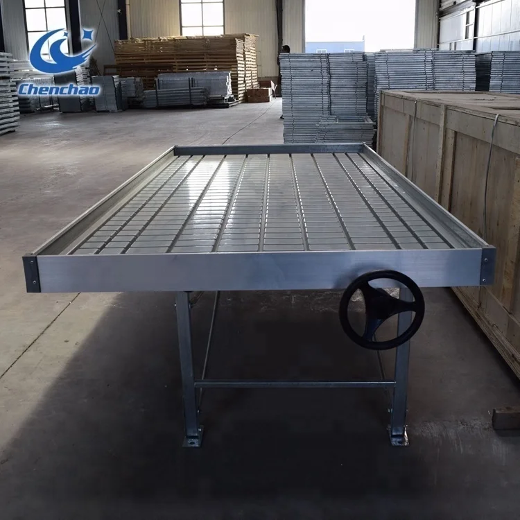 Greenhouse Structure With Flood And Drain Hydro Table