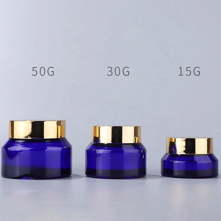 Inclined shoulder blue glass bottle 15 ml 30 ml 60 ml 100 ml 120 ml glass bottle and 15 g  30 g 50 g blue glass jar for cosmetic