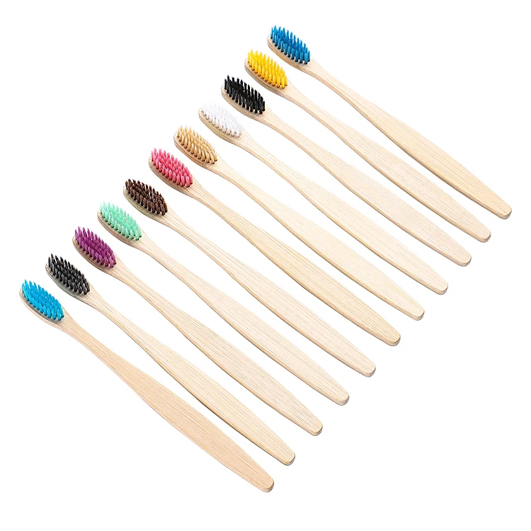 Adult Bamboo Toothbrush with medium bristled biodegradable bamboo toothbrushes in a recyclable, plastic free box.