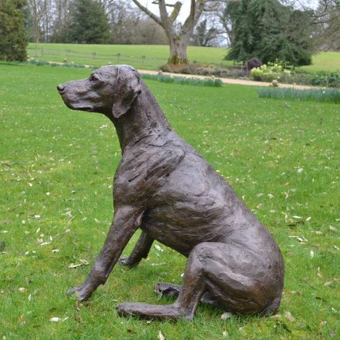 Brown dog bumpy bronze statue for the garden