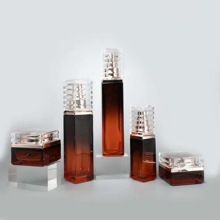 factory wholesale high quality Skincare Packing Set Amber Cosmetic Face Cream Jar Square Glass Body Lotion Bottle with Gold Pump