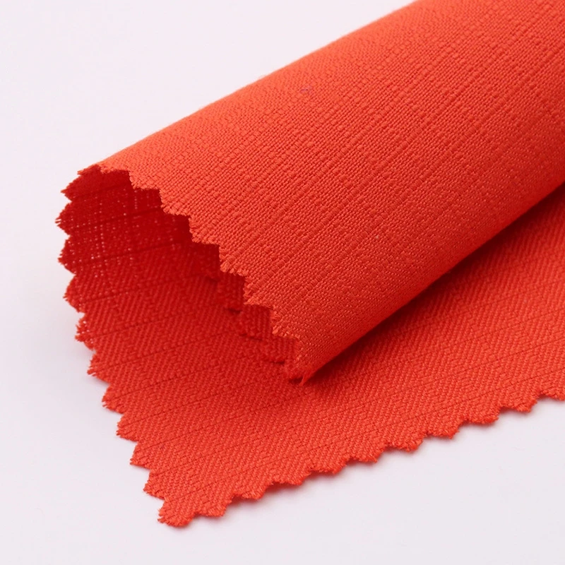 32s 210gsm ripstop IIIA Aramid Kevlar Fabric Orange Piece Dyed Flame Retardant Woven Twill for Garments Firefighters  Workwear