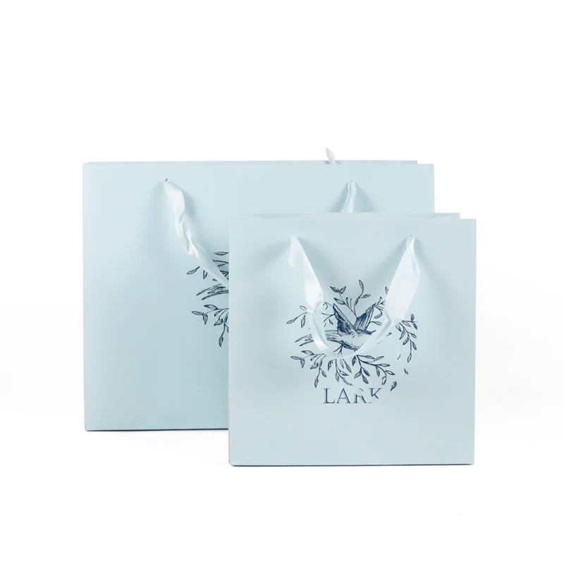 Crown win luxury blue gift wrapping paper bags wedding packaging with your own logo kraft package bolsa de carton art paper bag