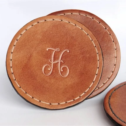 Wholesale Custom Round sewing on Clothing Leather Coaster with embossed logo Genuine leather PU logo tag patch