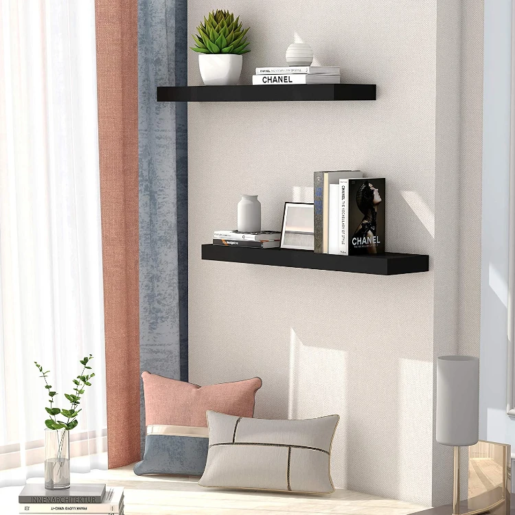 Black decorative wooden wall shelf suitable for storage in kitchen and bedroom