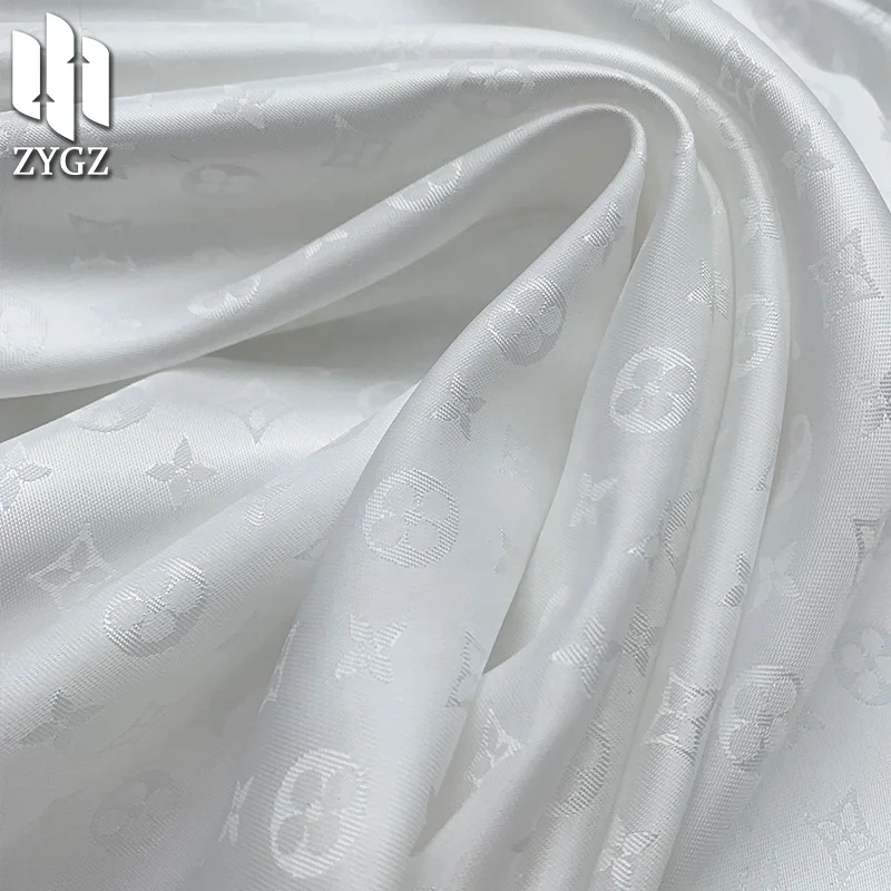 100 polyester 90GSM fashion brand jacquard yarn-dyed satin fabric clothing fabric lining wholesale