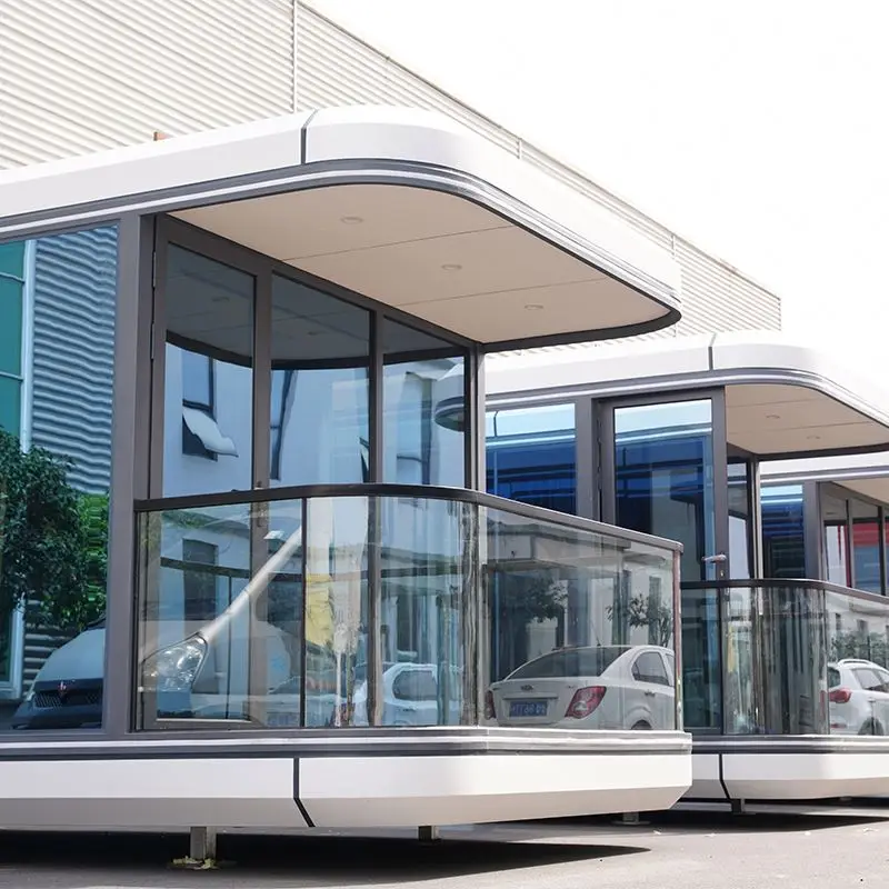 2024 New Style Vessel Container Houses Prefab Space Capsule E7 Cottage Boat House Luxury Showroom for USA