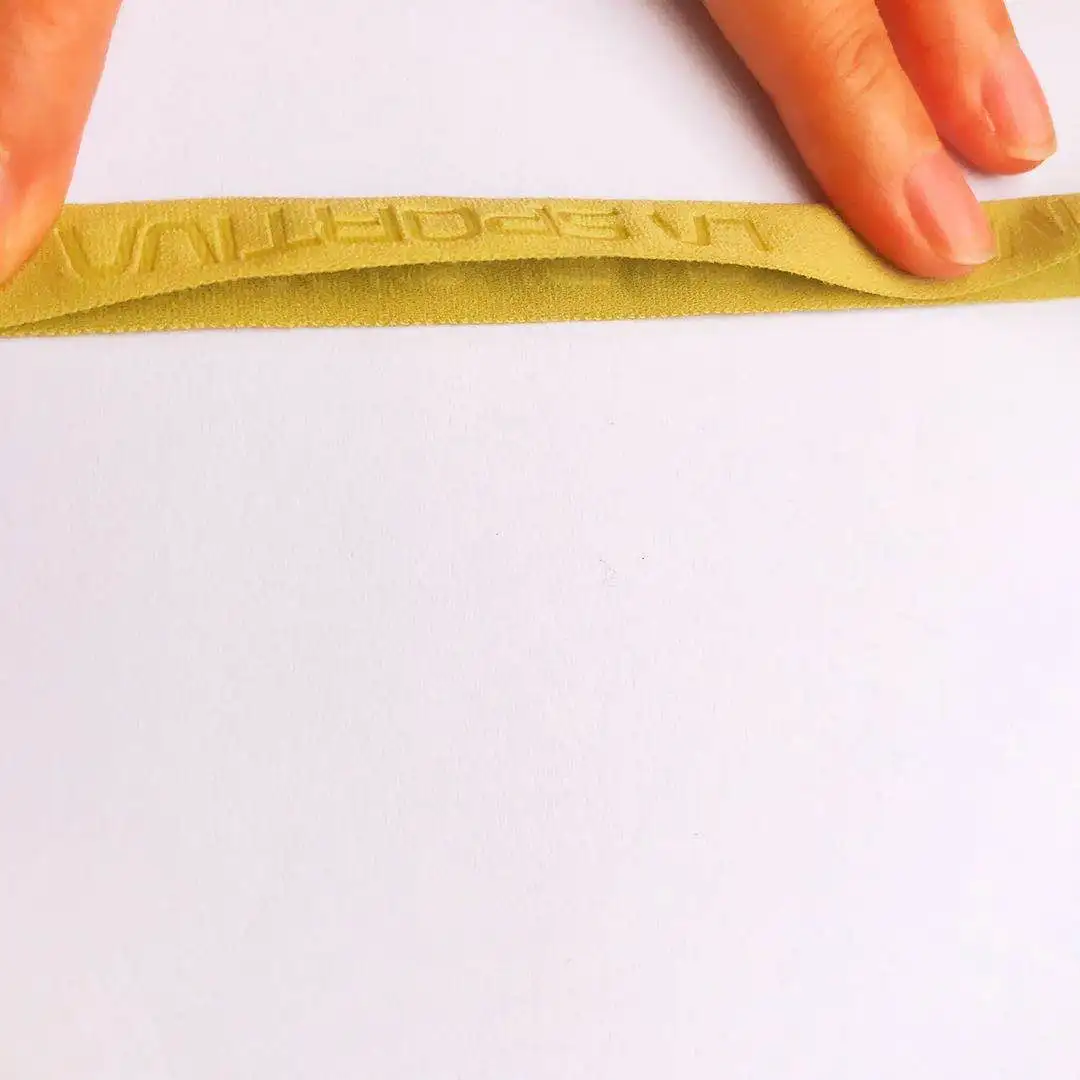 
20mm green fold over elastic nylon webbing with custom hot stamped logo 