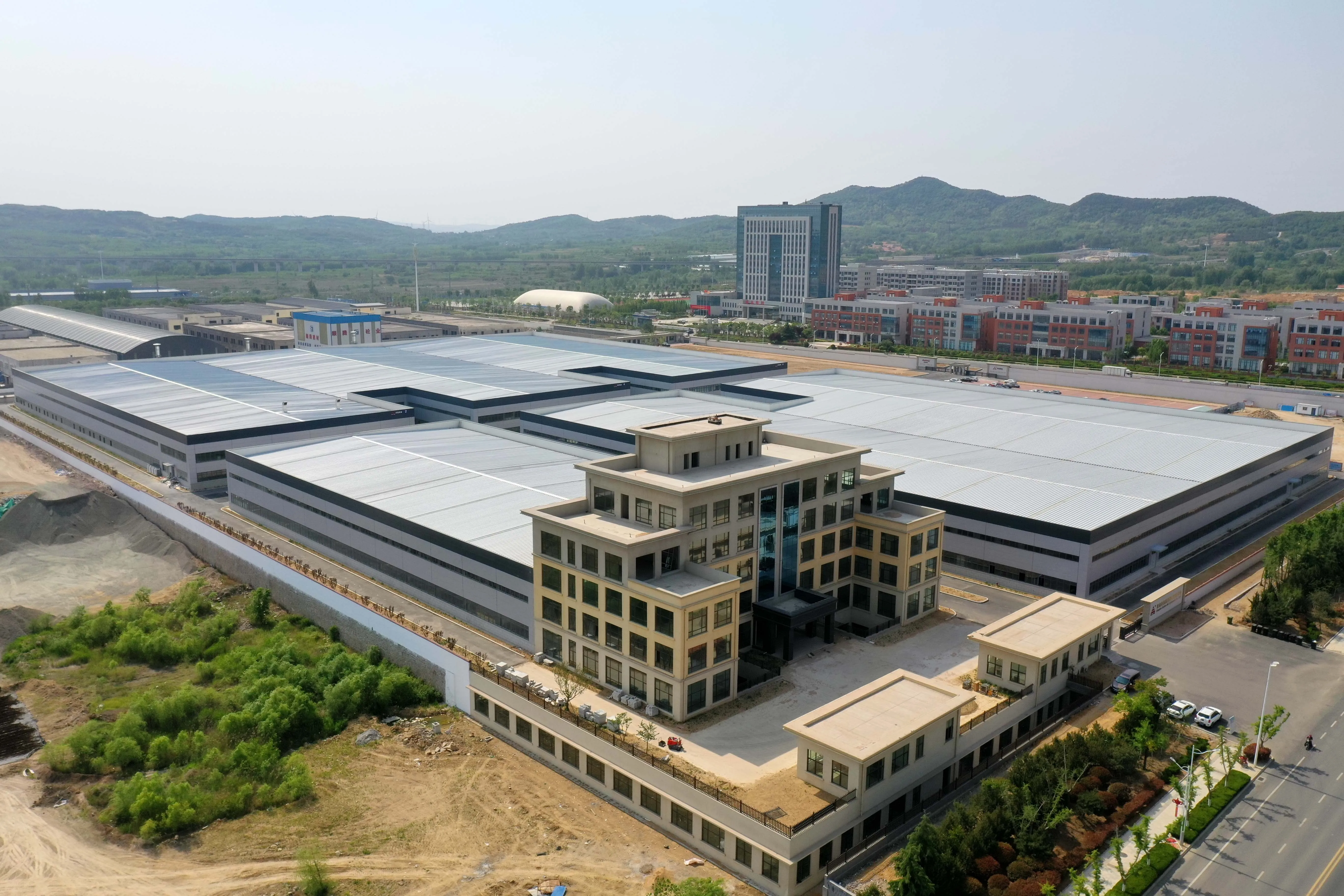 Multi functional large industrial factory plant workshop logistics warehouse Manufactured High standard steel structure building