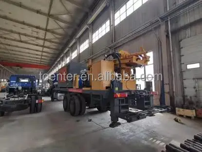 Vehicle-mounted large down-the-hole drilling rig and air compressor integrated car drill