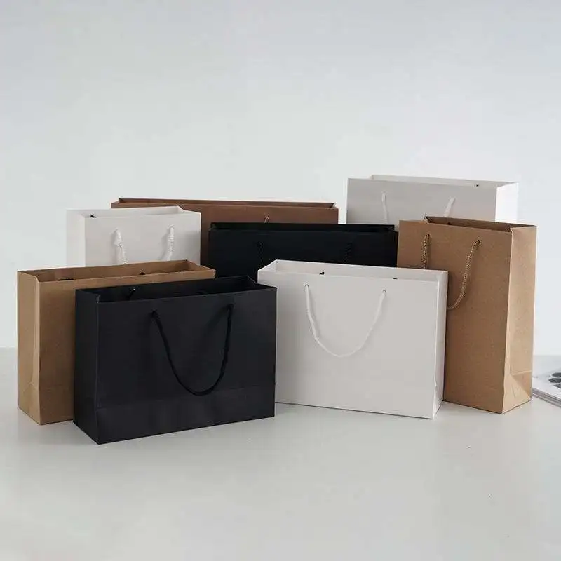 Top Quality Custom logo Printed Paper Bag for Gift /clothes Packaging Paper Shopping Bag with Die Cut Handle