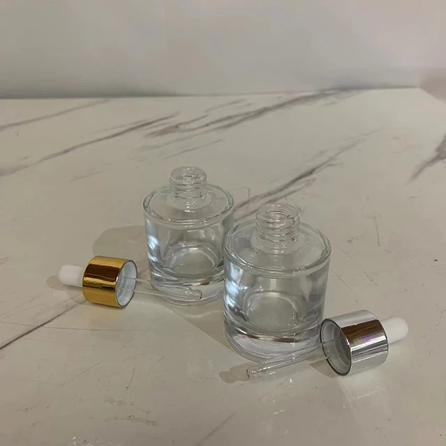 Hengjian wholesale 30ml glass essential oil bottle with dropper for serum bottles cosmetic packaging
