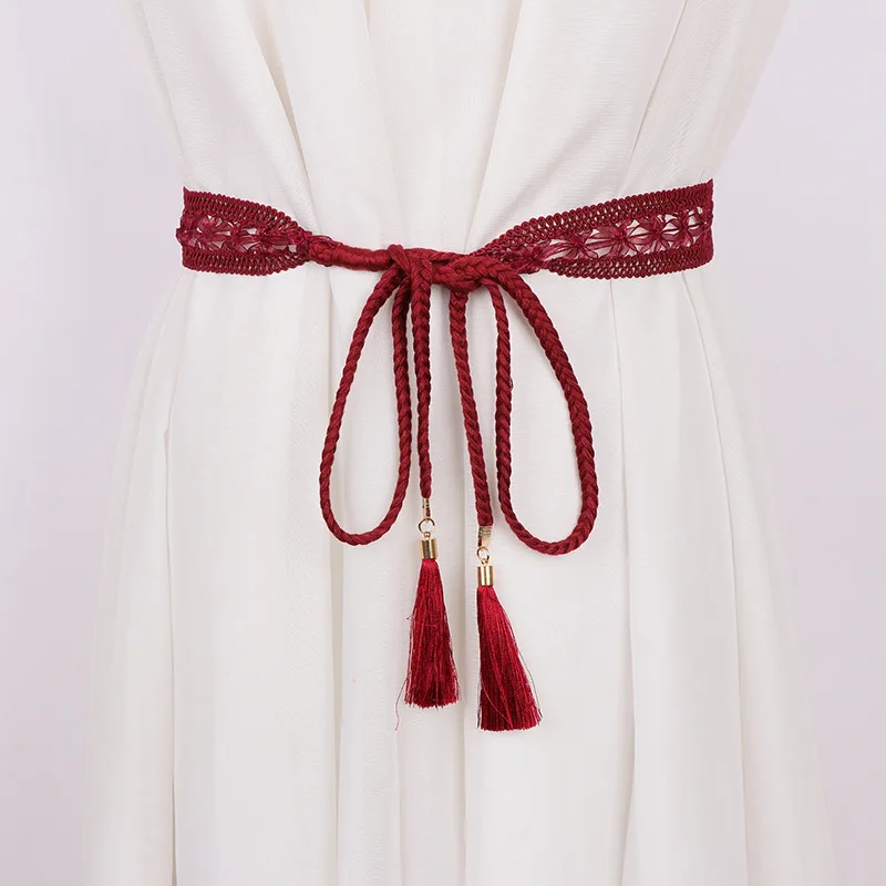 Женский плетеный пояс с бахромой