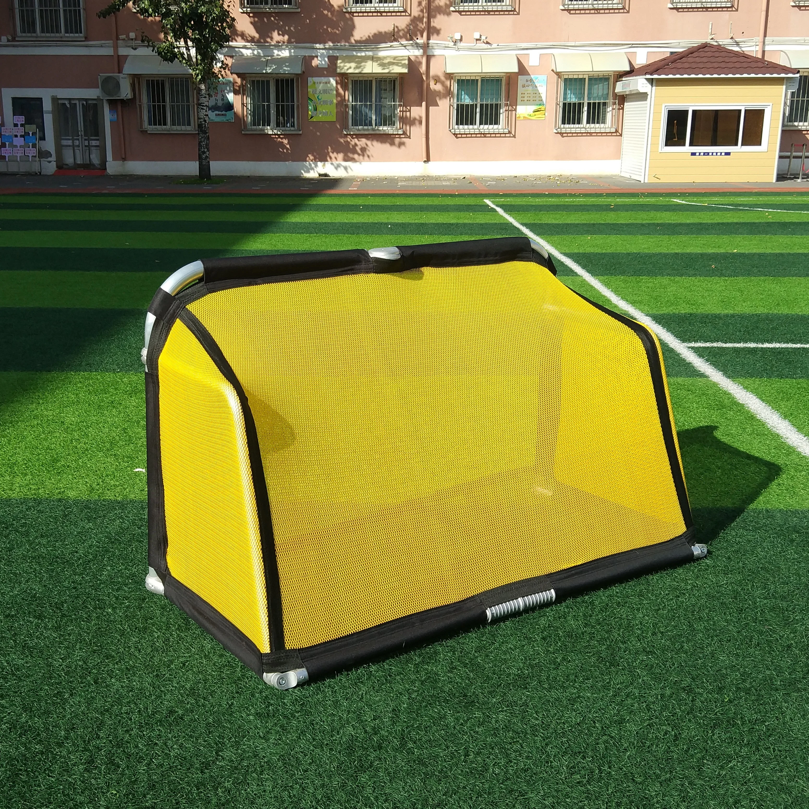 4 ft Kid using foldable  mini aluminum portable soccer goal