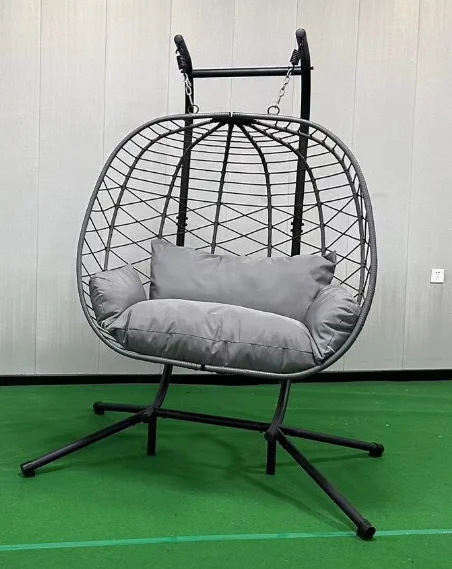Складное кресло-качалка из ротанга с подставкой