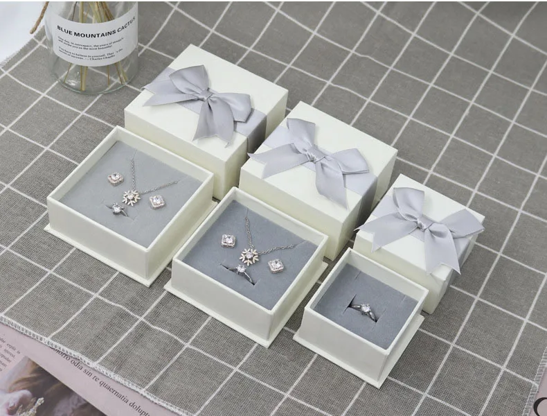 Xinfly Rectangle  Ribbon Bow Imitation Leather Paper Jewelry Gift Box Necklace Ring Earrings Paperboard Packaging Custom Logo