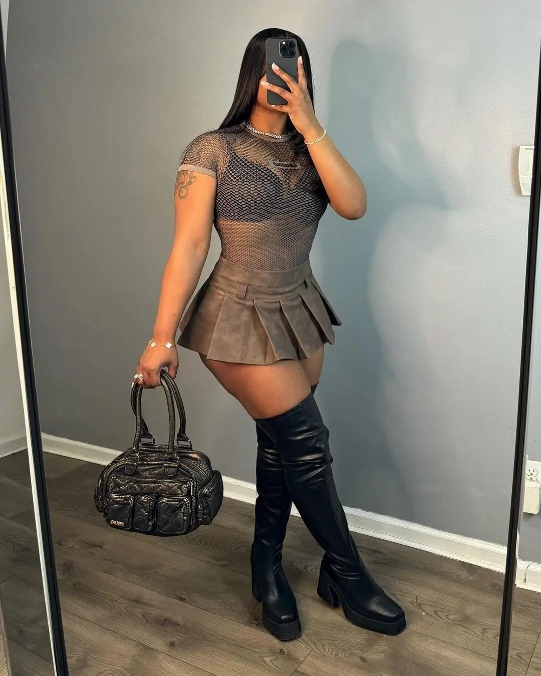 2024 New arrivals S-2XL fashion trendy boutique pu leather pleated mini womens skirts