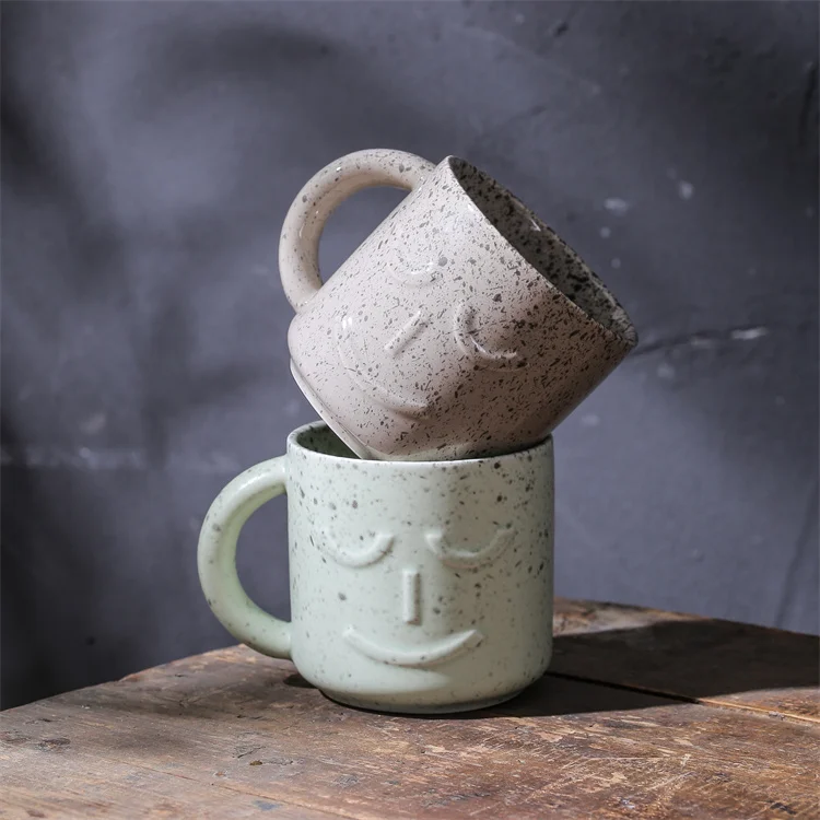 Wholesale nordic style customized splash ink face design tea milk cup set ceramic coffee mugs with smiley face pattern