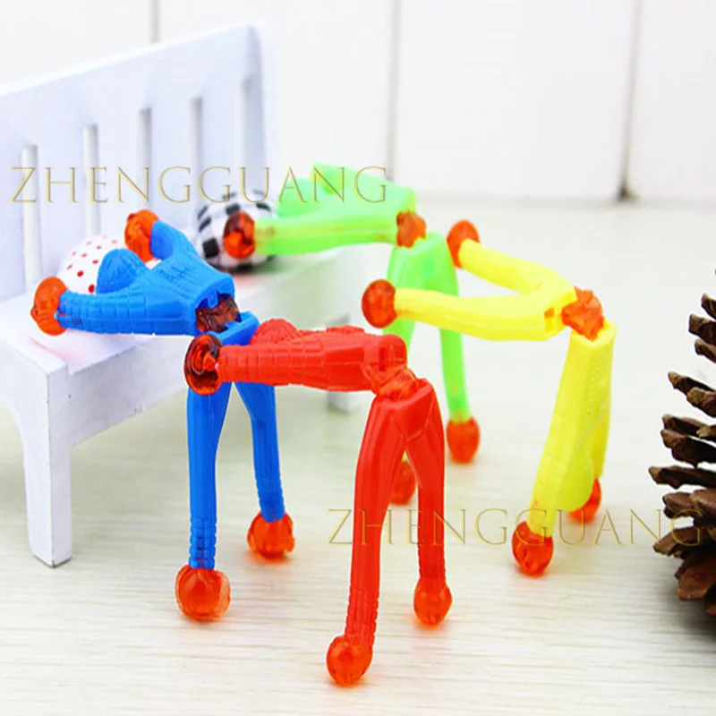 Zhengguang Wholesale Stretchy Climbing Man Window Crawlers Sticky Toys Favors Kid Play Climbing Toy Sticky Wall Climbing Toy
