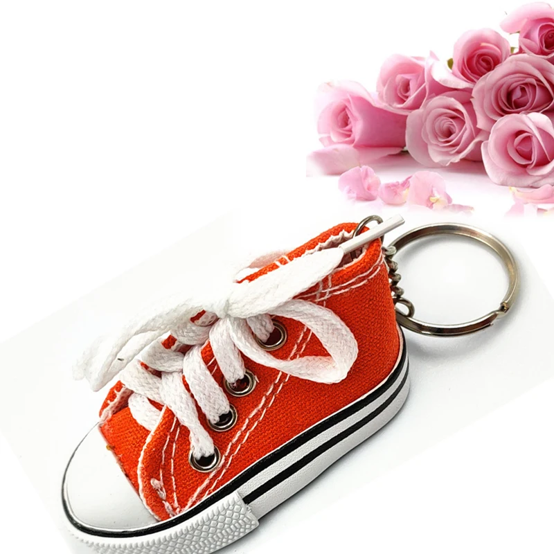 Customizable Mini simulation pvc 3d rubber canvas shoes keychain soccer  sports shoes car personalized keychain creative gifts