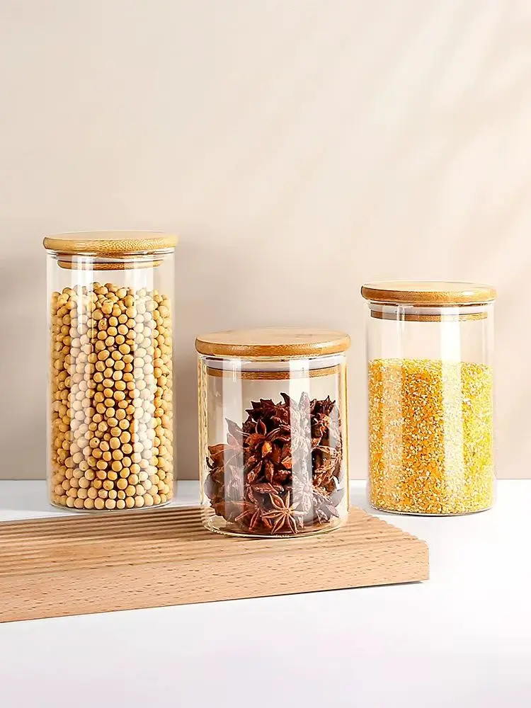 hot sell heat resistant high borosilicate kitchen containers cylinder glass sealed food cereal storage jar with bamboo lid