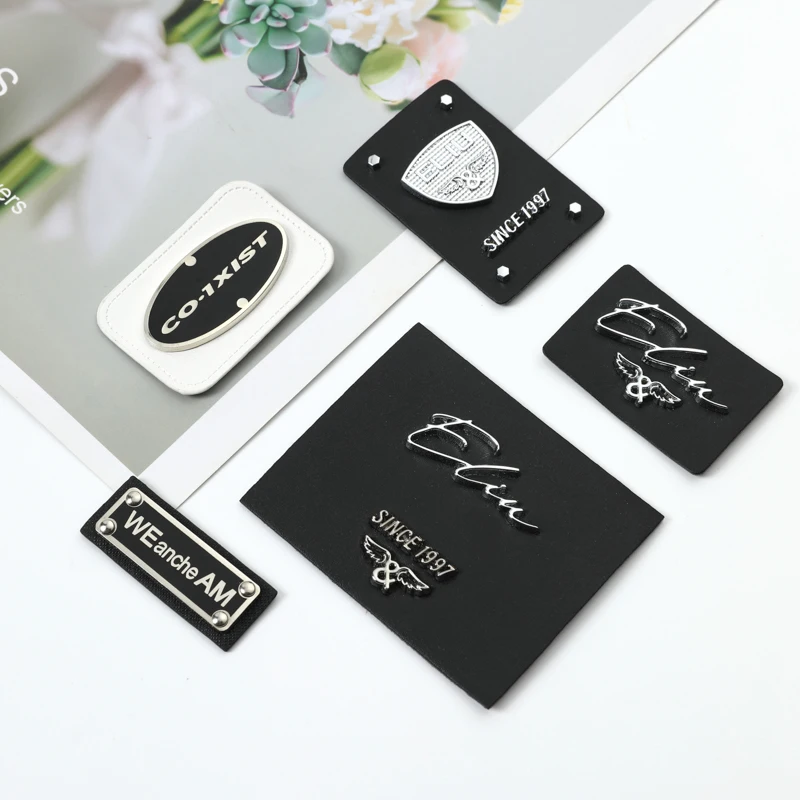 2024 good supplier metal logo labels with leather sewing label For Clothing Garment Metal Accessories