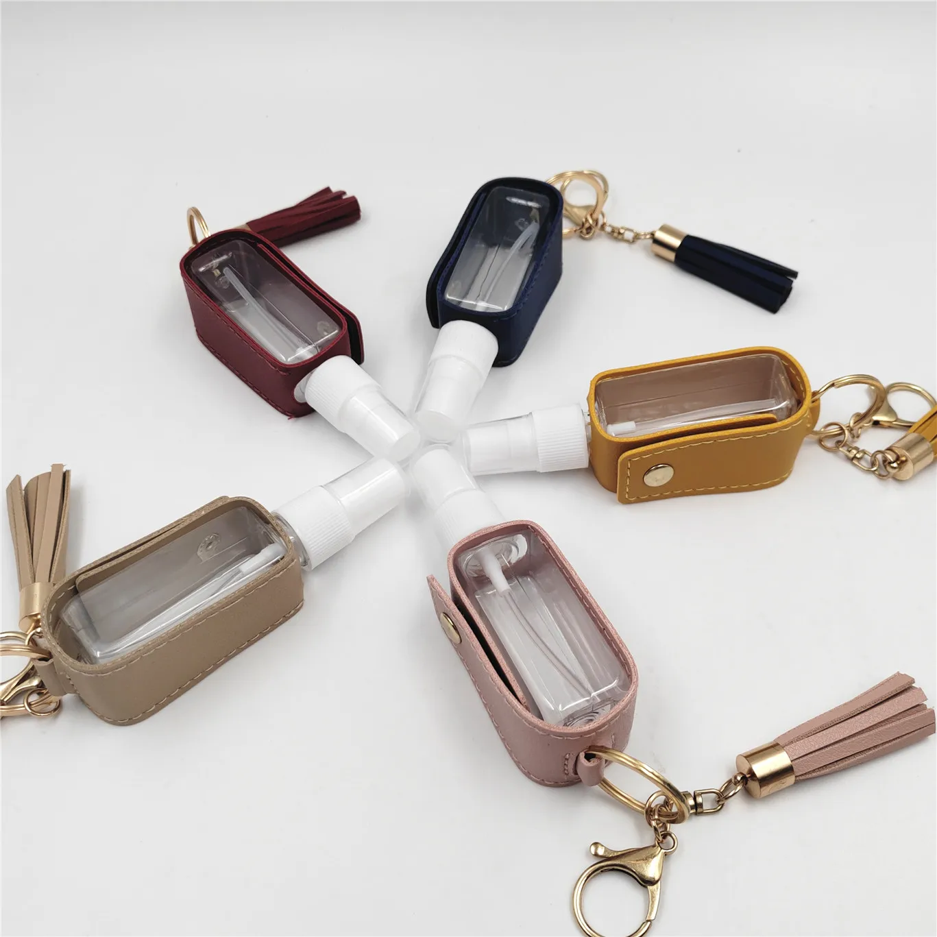 Pocket 30ml Mini Plastic Spray Hand Sanitizer Alcohol Pet Bottle with PU Leather Keychain Holder Plastic Bottle Manufacturer