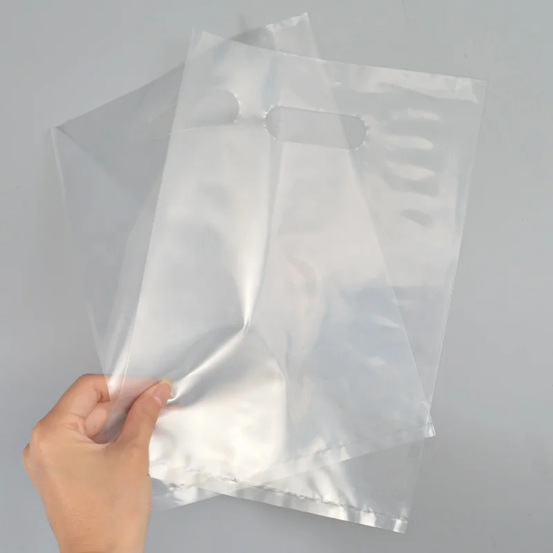 customize merchandise plastic bags handle luxury die cut clear poly bags ldpe retail transparent plastic bag carrier for clothes