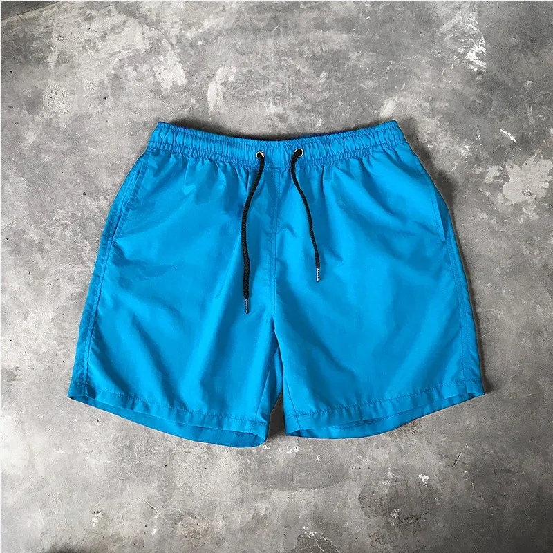 OEM Customized Logo 18 Colors Solid Plain Men Swim Trunks Quick Dry Outdoor Beach Shorts Board Shorts Swimwear For Men