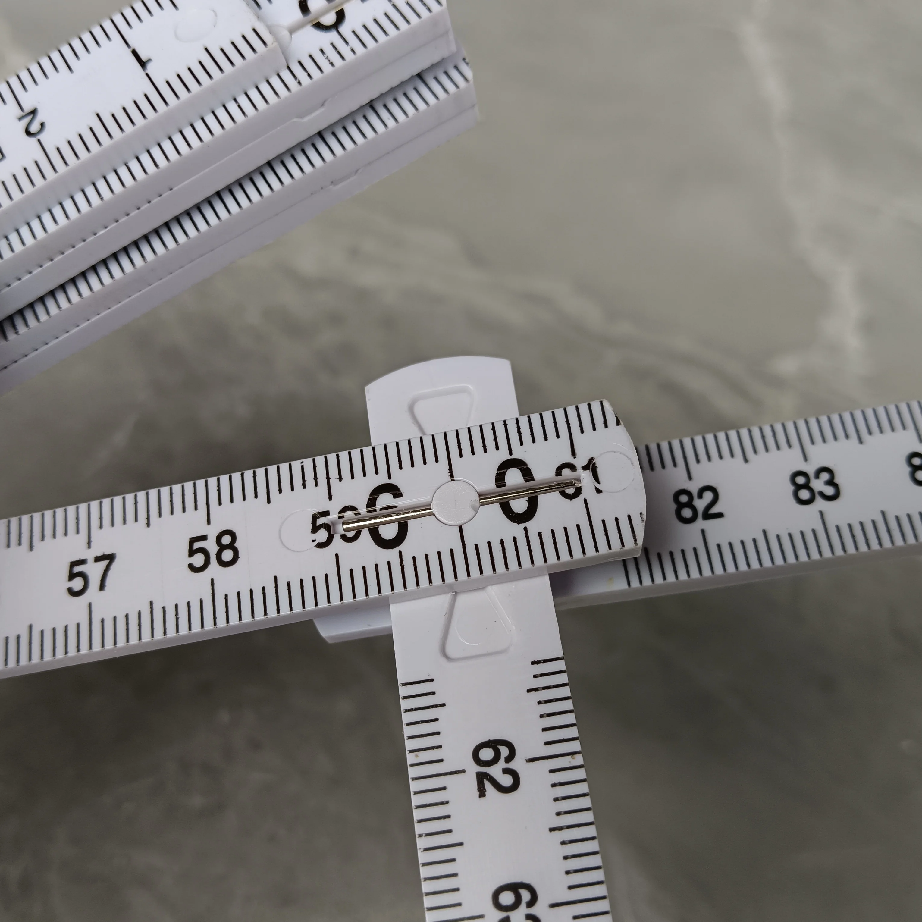White ABS Folding Ruler suitable for measuring woodworking project