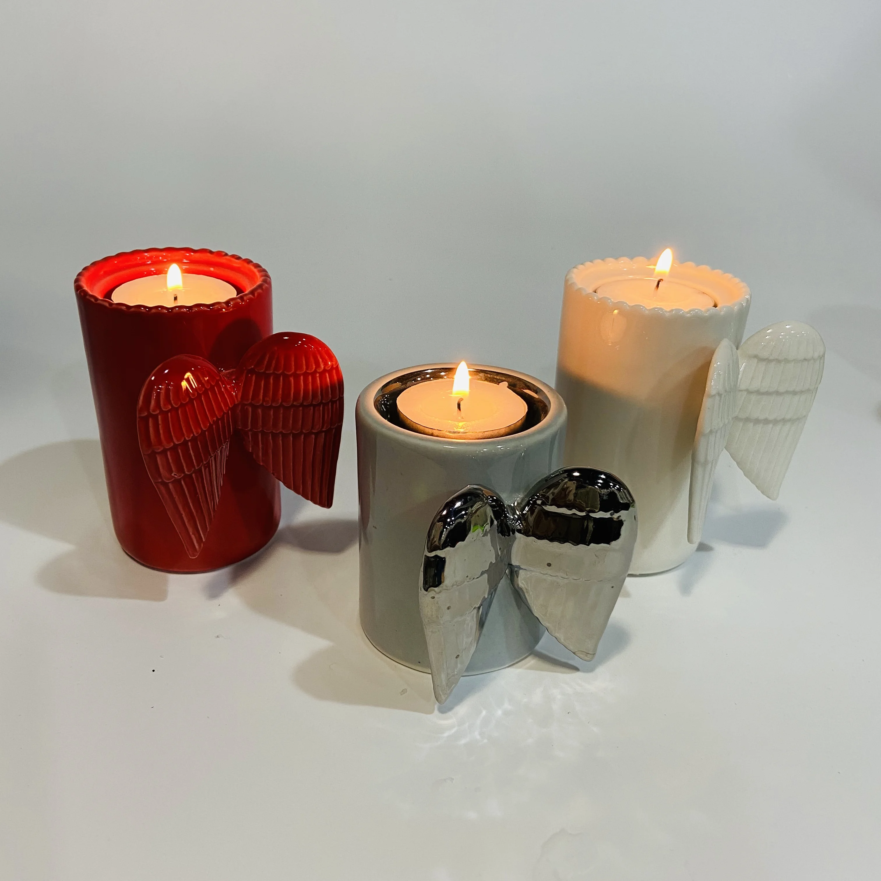 
Best selling angel wings decor ceramic candle cup holder 