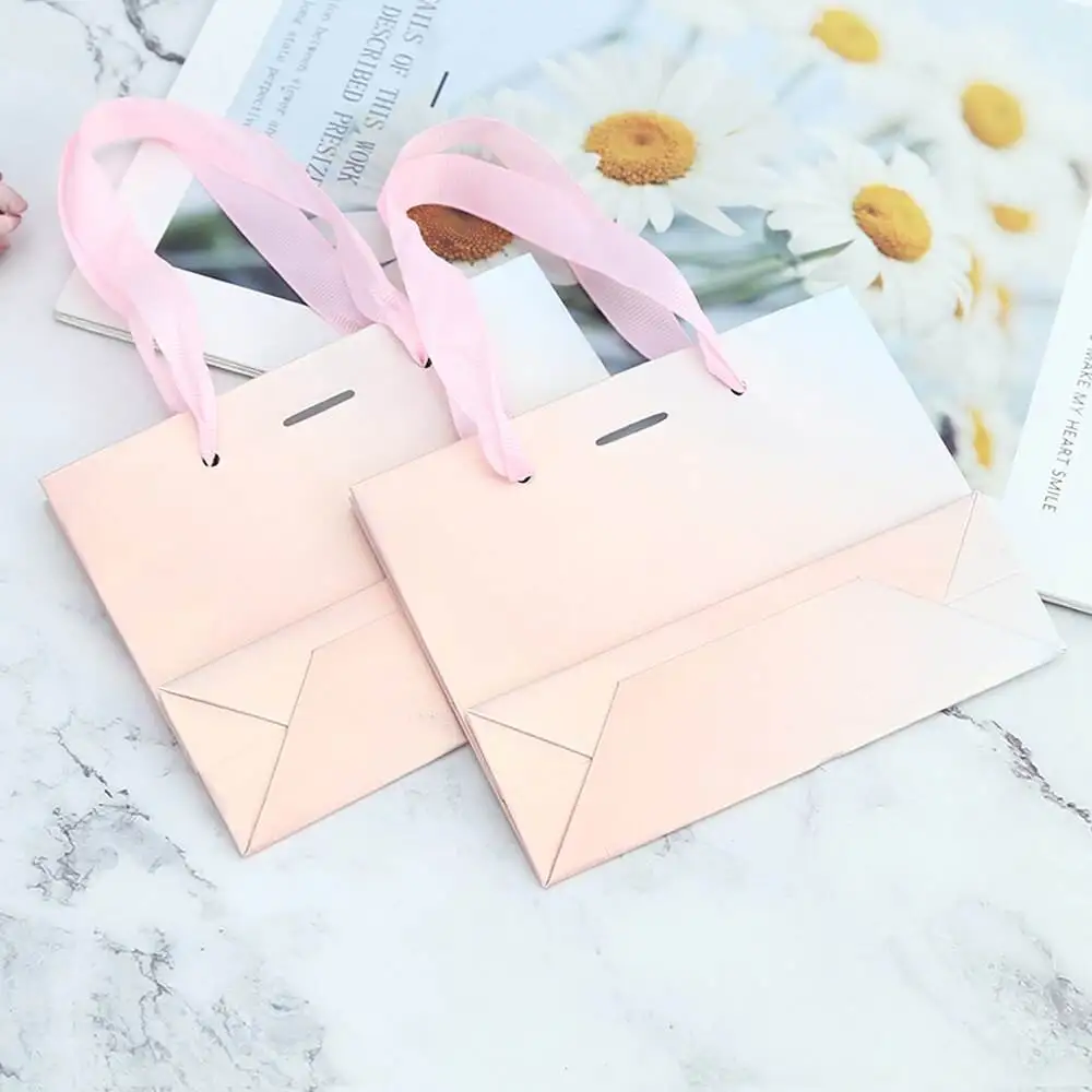 Wholesale Retail Boutique Shopping And Gift Paper Bags Custom Printed Logo Luxury White Paper Bags For Packaging