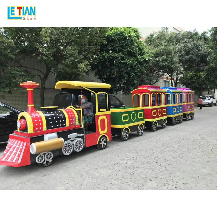 Attractive outdoor playground tourist train prices amusement park kids trackless train rides for sale