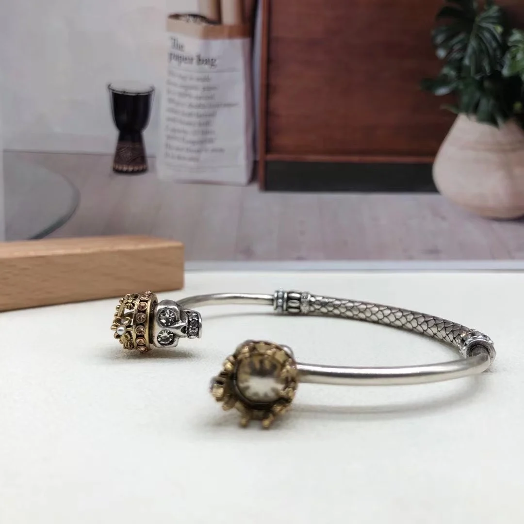 Alexander McQueens Factory Direct  925 Silver Double Gollum Head Zircon Open Bracelet with Retro Style Design and Premium Sense