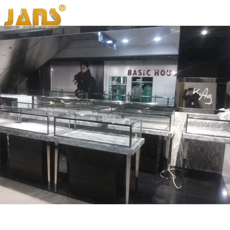 
Luxury high-grade marble curved glass jewelry display cabinet showcase with LED light 