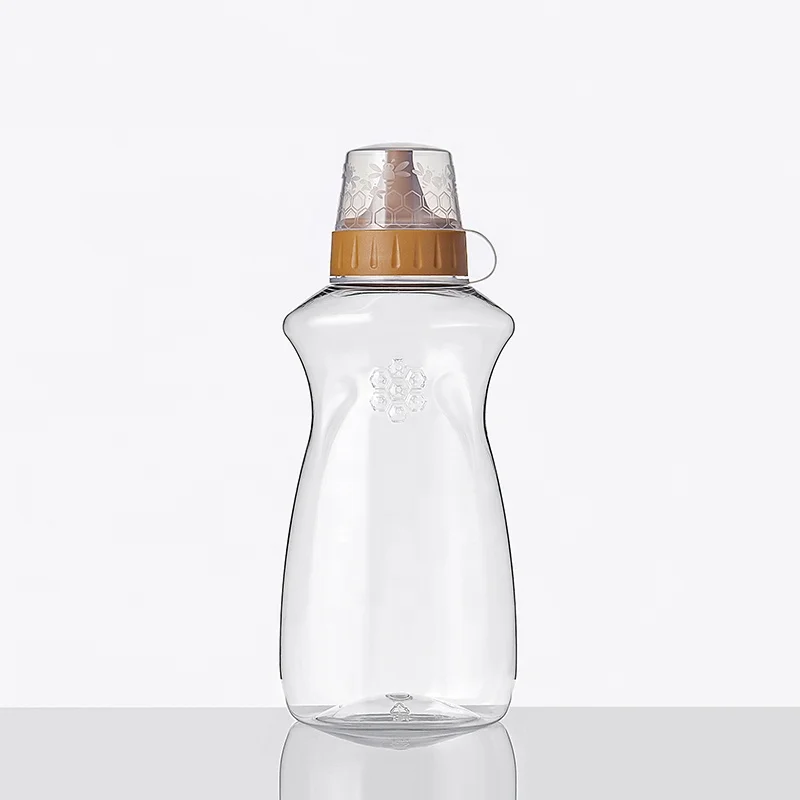 Factory wholesale 500g 800g 1000g PET empty honey container jars  honey packaging plastic bottle with tip cap