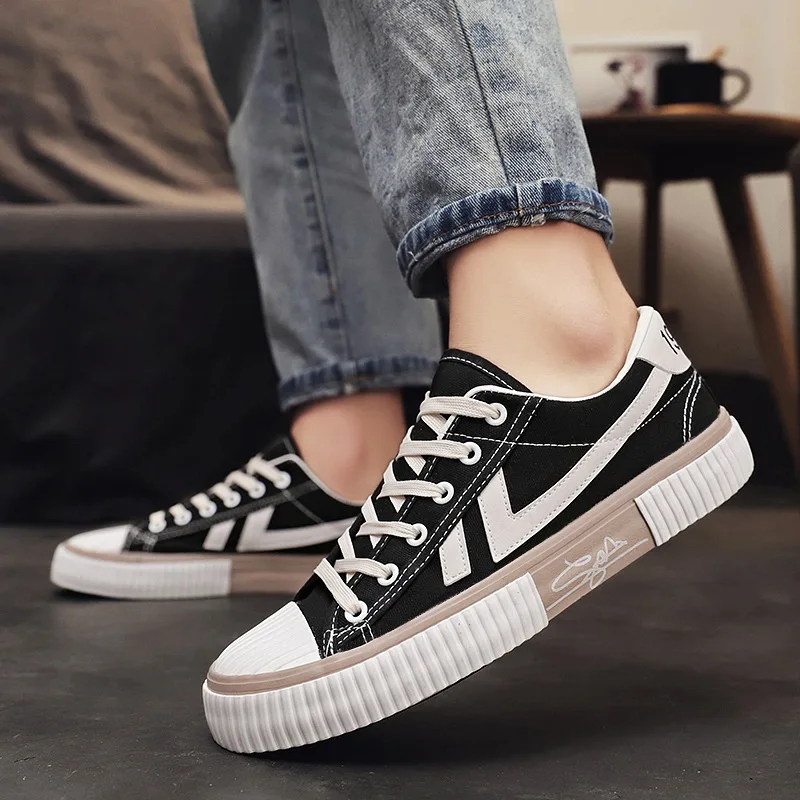 Wholesale custom printed fashion classic lace up black vulcanized flat low top slip on blank sneakers casual men canvas shoes