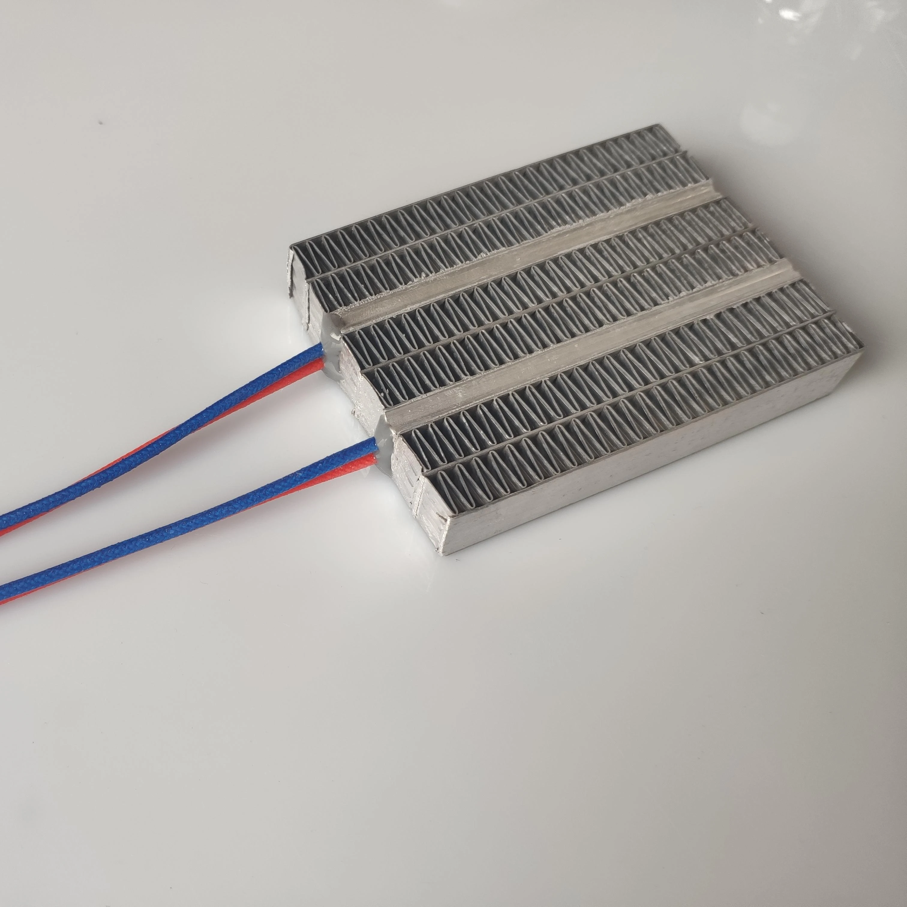 Electric PTC air heating transfer element on household appliances