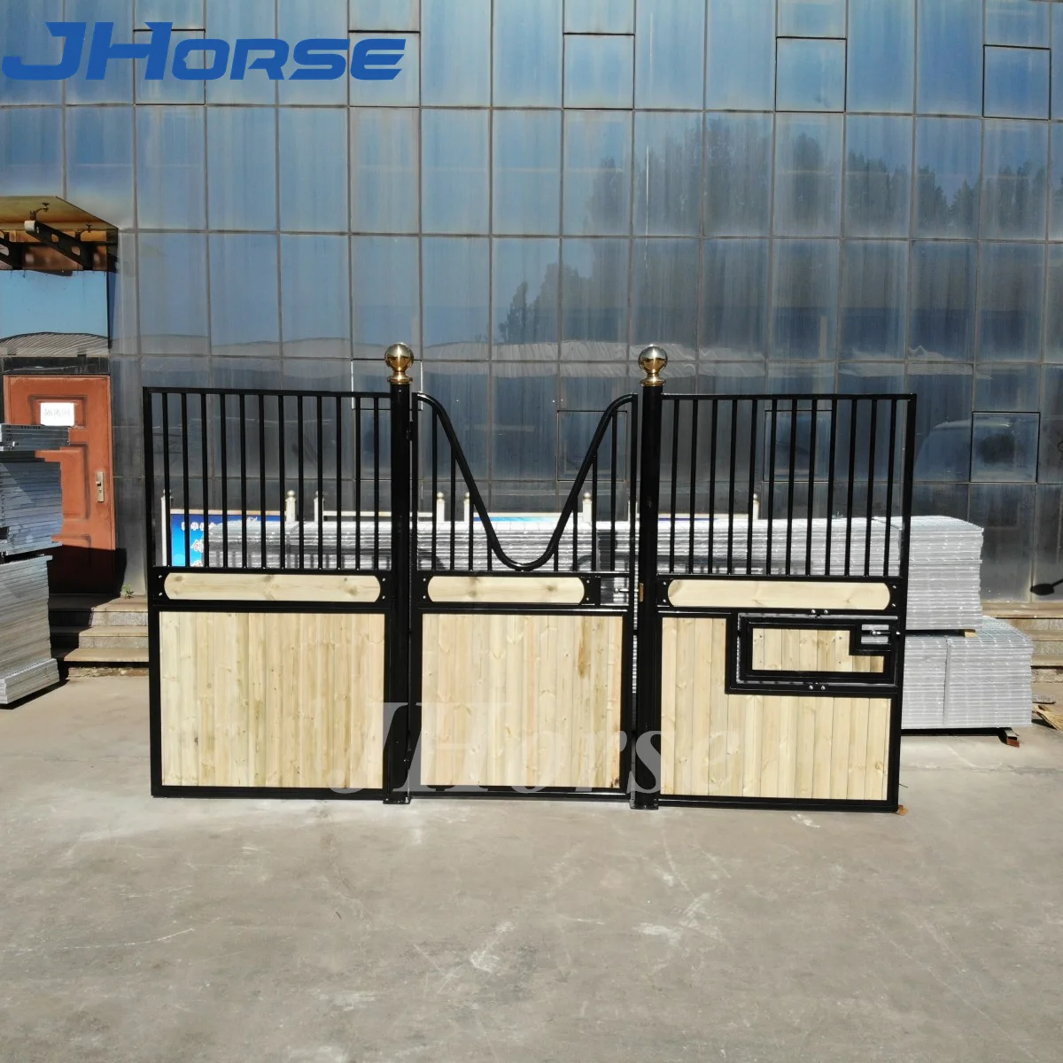 American Custom European luxury horse stables with swing hay rack and feeder manufacturer