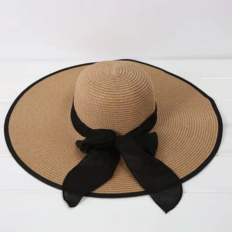 2022Summer new straw hat bowknot sunshade big hat along the ladies beach sunshade big straw hat manufacturers wholesale