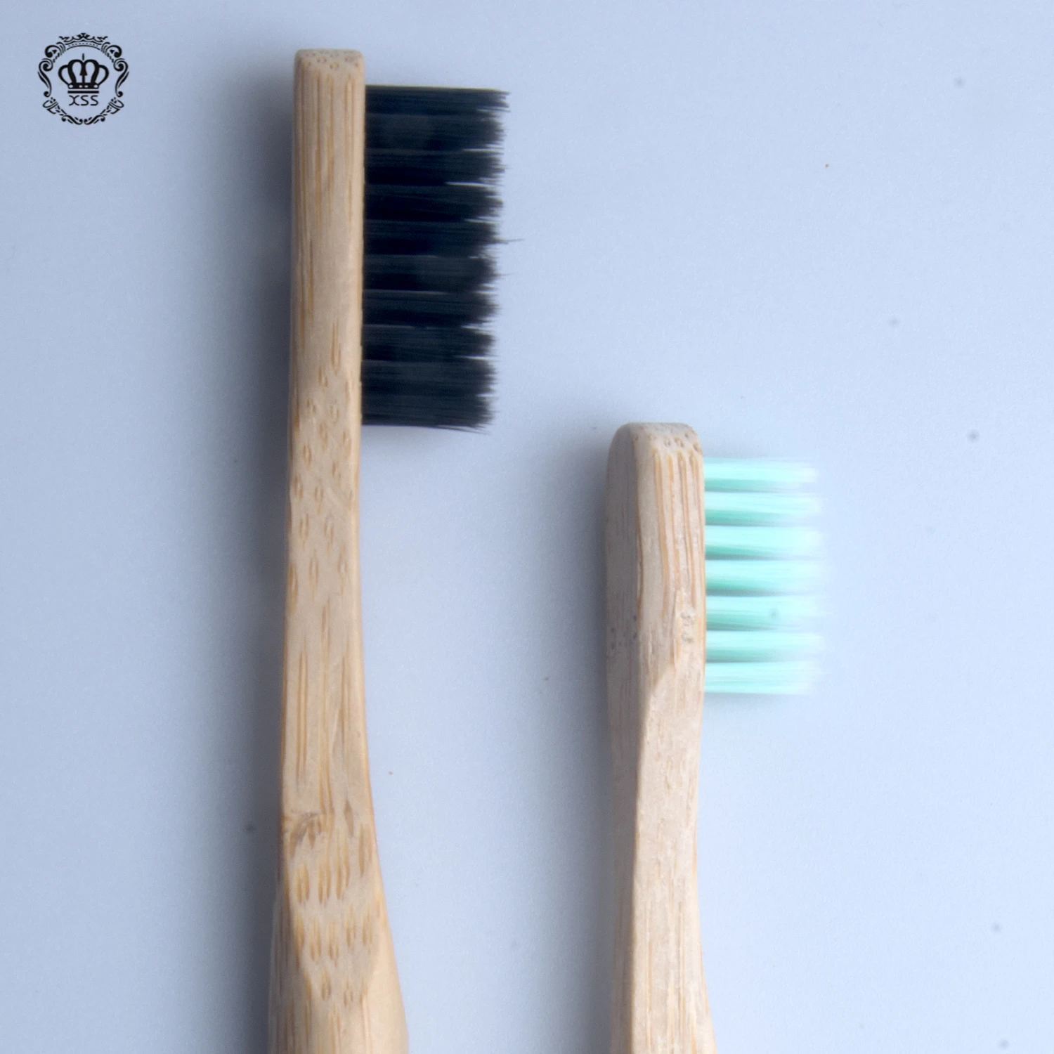 XiBrush Custom OEM Free Laser Logo Round Handle Charcoal Bristles Bamboo Toothbrush Pack In Bamboo Case With Customized Logo